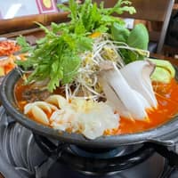 왕골남서문장작불곰탕 로고
